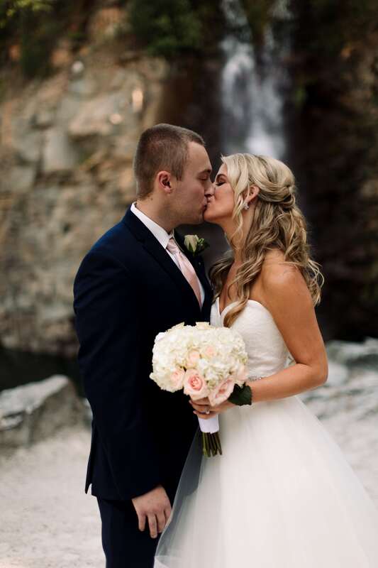 bride and groom kissing at Charlotte Wedding