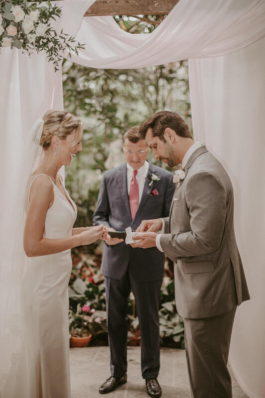 saying vows at beautiful wedding photoshoot