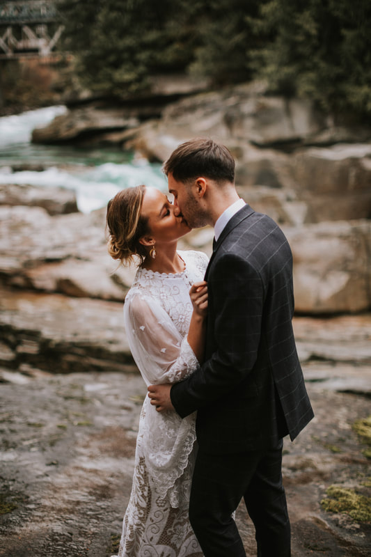 bride and groom kiss at their elopement ceremony